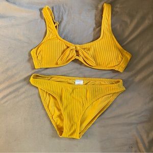 Yellow ribbed bikini top and bottom.